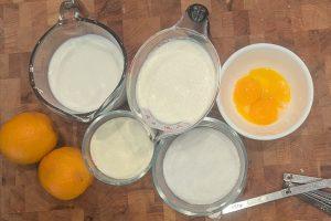 overhead view of portioned ingredients for blood orange ice cream.