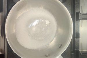 sugar and guar gum in a saucepan.