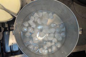 an ice bath in a stainless bowl.