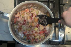 stirring chopped rhubarb, sugar, and lemon juice in a saucepan.