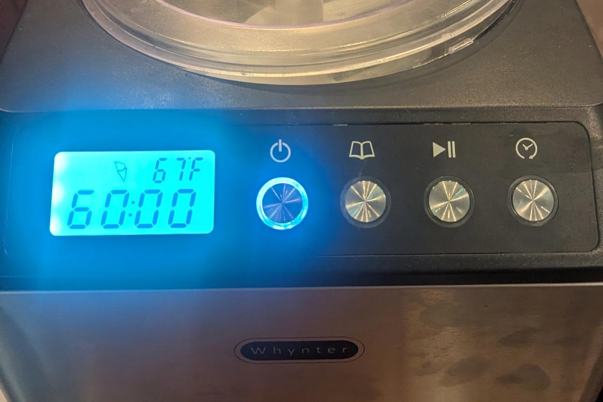 closeup of the lit LCD screen and buttons on a whynter icm-201sb ice cream maker.