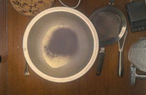 sifted blue butterfly pea powder over sugar, skim milk powder, and guar gum.
