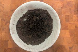 crushed Oreo cookies in a bowl.