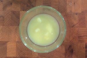 melted butter in a small glass bowl.
