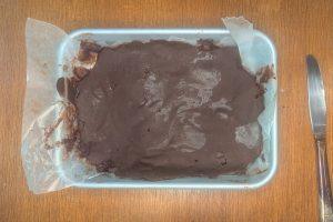 hardened chocolate ganache in a thin layer on a tray.