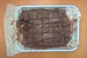 ganache cut into squares on a tray.