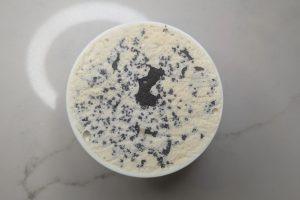 overhead view of a set pint of copycat vermonty python ice cream in a pint.