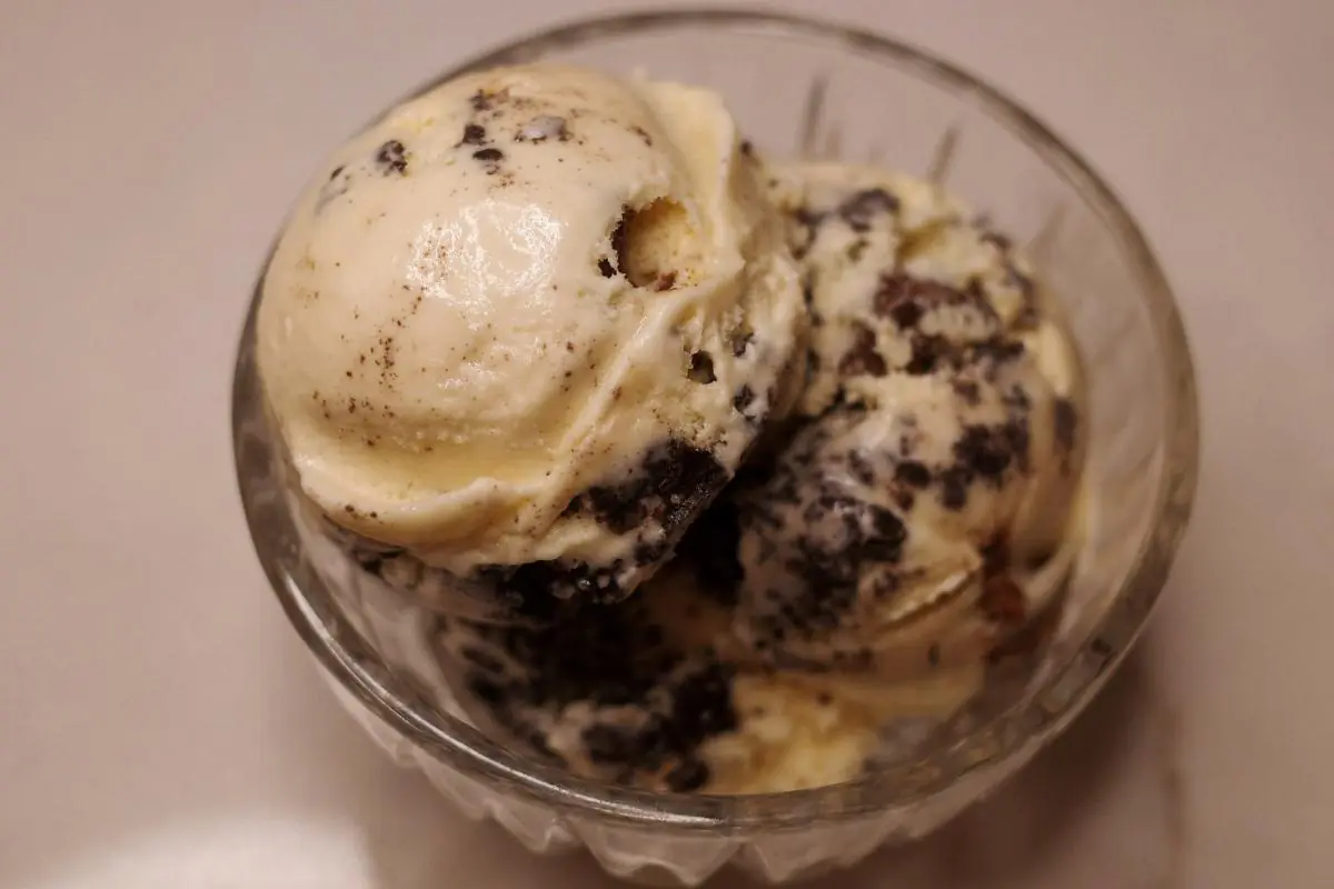 overhead view of scoops of copycat vermonty python ice cream in a glass dish.
