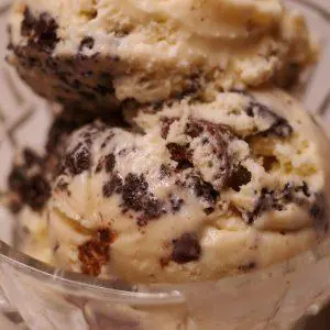 closeup of scoops of copycat vermonty python ice cream in a glass dish.