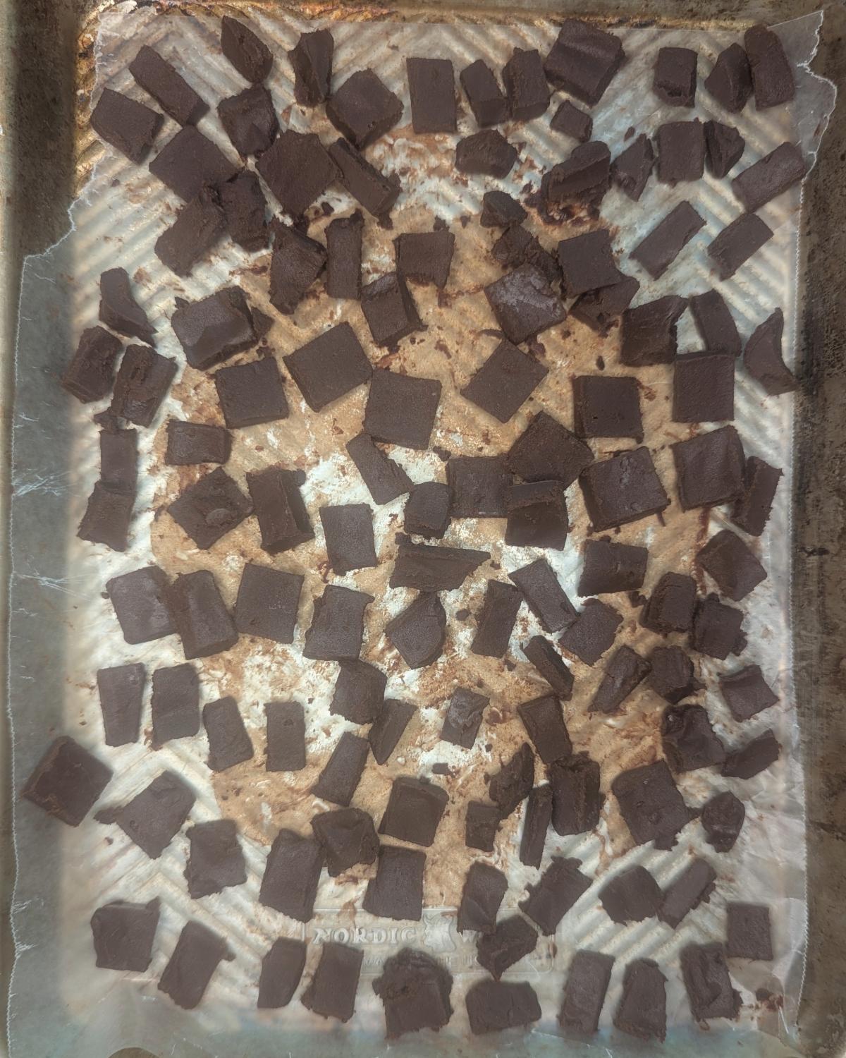 overhead view of fudge bits for ice cream on a baking tray.