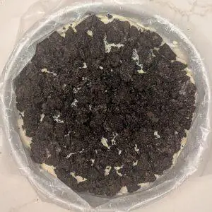 overhead view of ice cream cake crunchies in a springform pan.