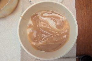 swirling apple cider caramel into ice cream.
