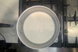 custard ice cream base in a saucepan before adding eggs.