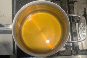 apple cider in a saucepan.