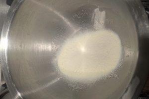 skim milk powder and guar gum in a bowl.