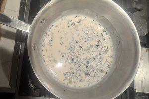steeped chai milk in a saucepan.